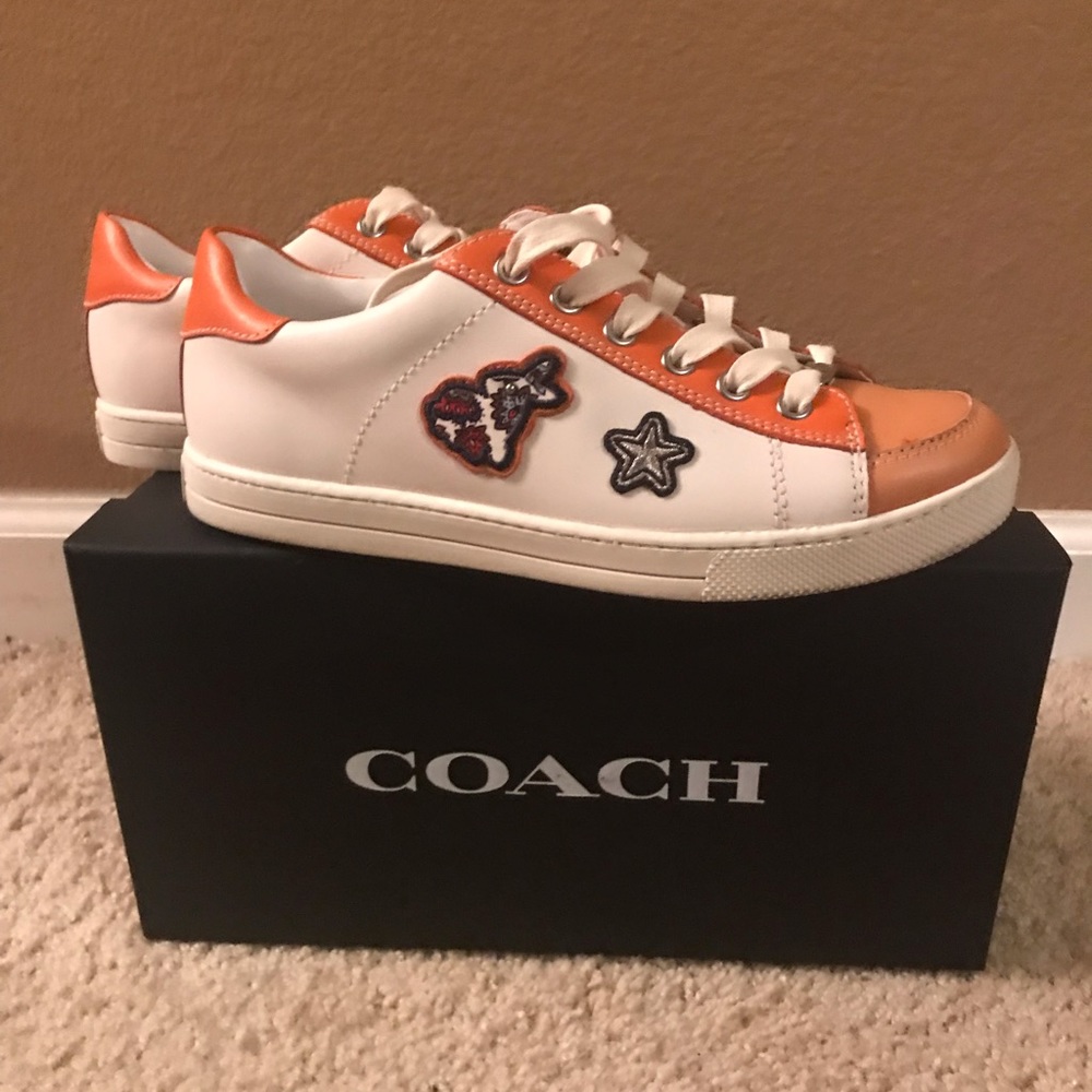 All authentic leather Coach sneakers.